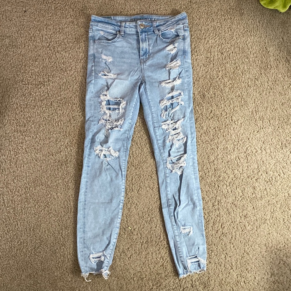 ripped american eagle skinny jeans light blue